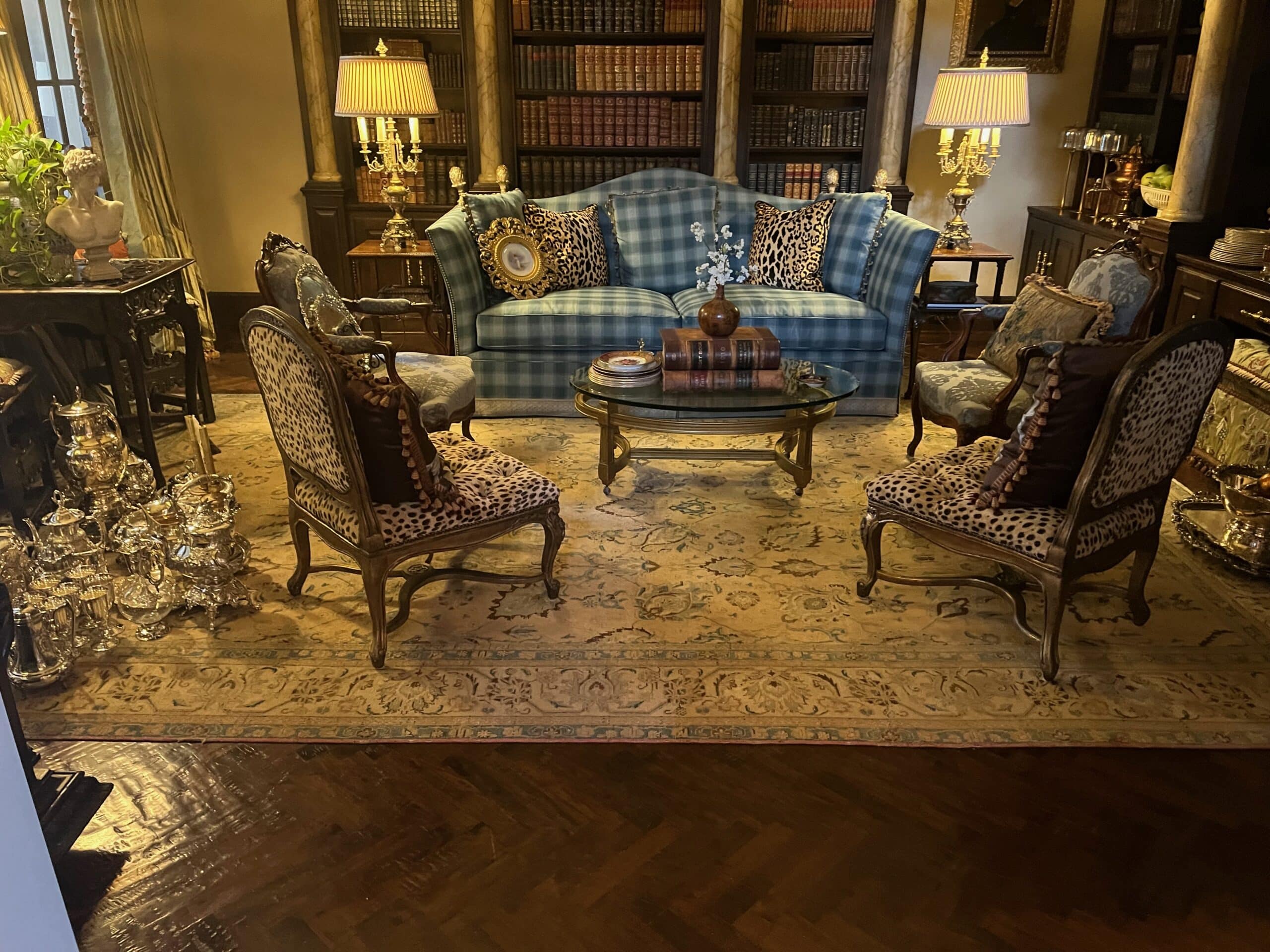 Dark herringbone hardwood floor in a traditional formal living room