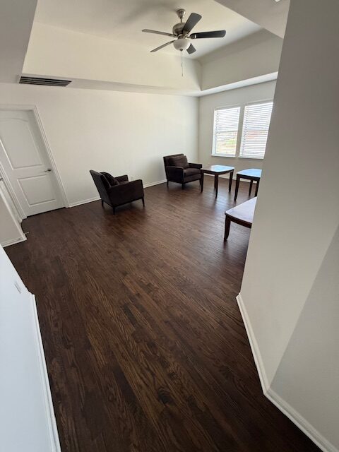 Dark hardwood floors in a Frisco living room