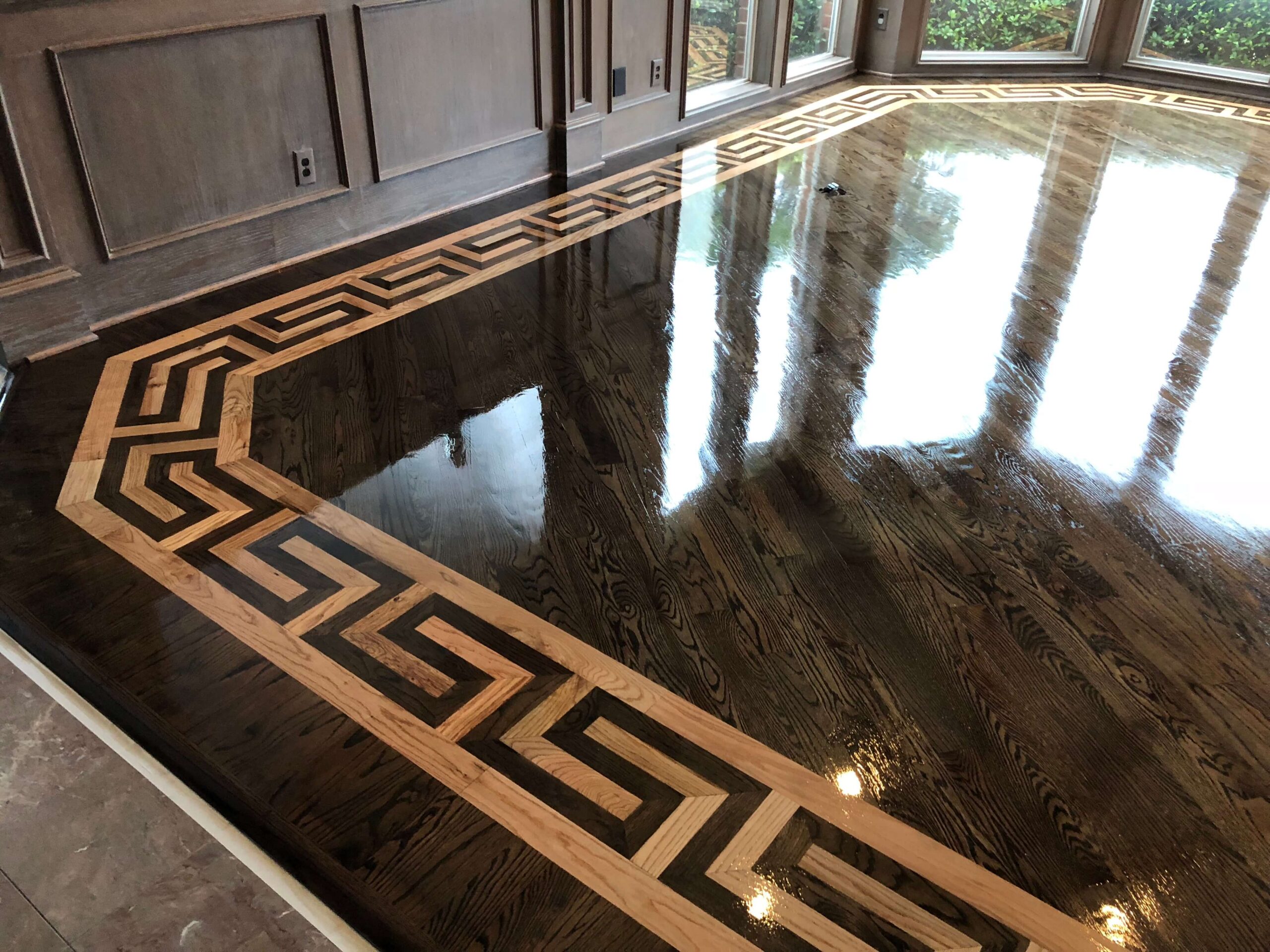 Custom pattern hardwood floor finished on site