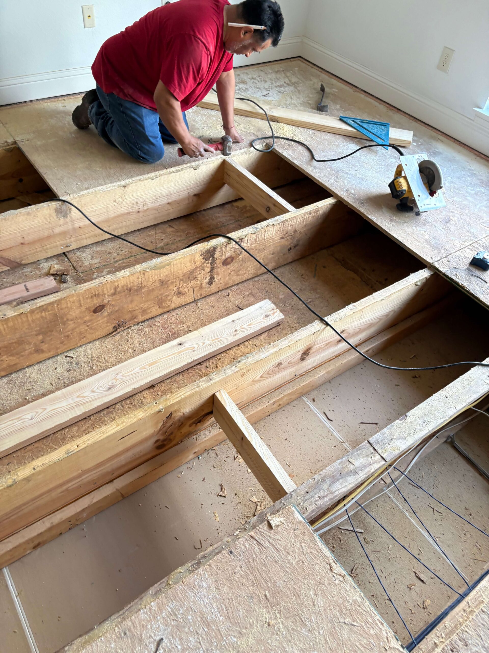 Second floor plywood subfloor being replaced after an upstairs leak