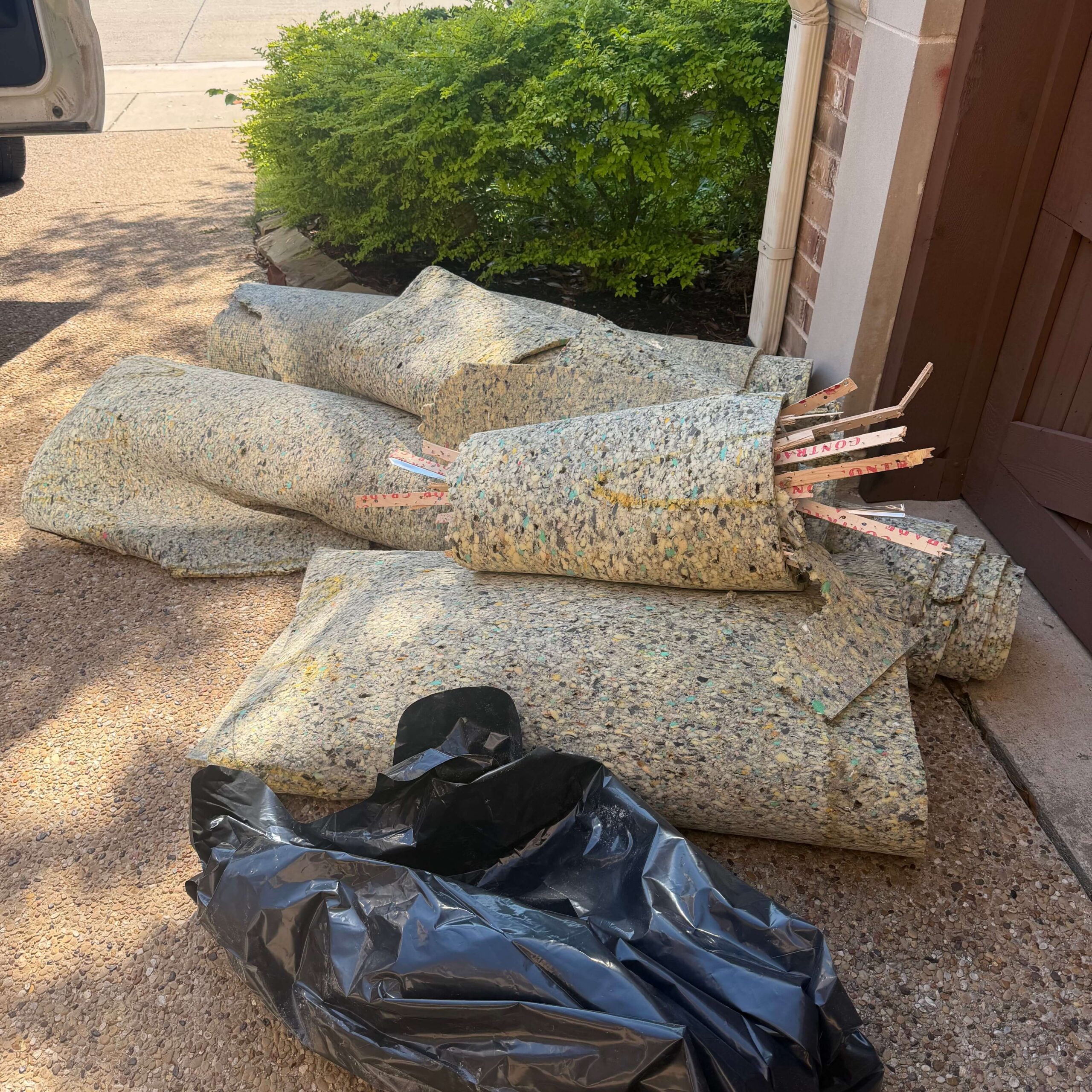 Water damaged hardwood floor assessed on a Plano, TX job